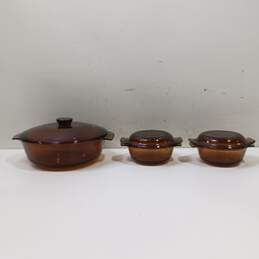 3 Anchor Hocking Amber Casserole dishes w/lids