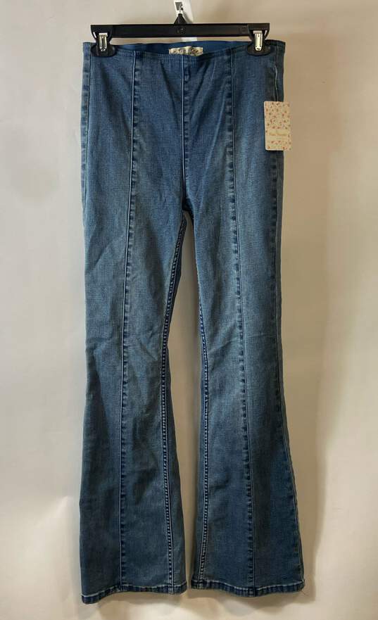 NWT We The Free Womens Blue Medium Wash Mid Rise Denim Flared Jeans Size 26 image number 1