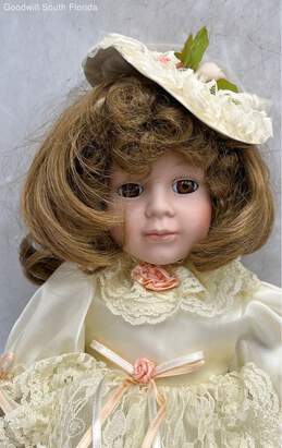 Anco Collectible Porcelain Doll In Beige Dress With Bag alternative image