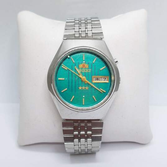 Vintage Men's ORIENT Automatic Green Dial Day/Date Stainless Steel Watch image number 1