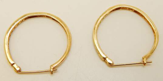 10K Yellow Gold 0.18 CTTW Round Channel Set Diamond Hoop Earrings 2.2g image number 2
