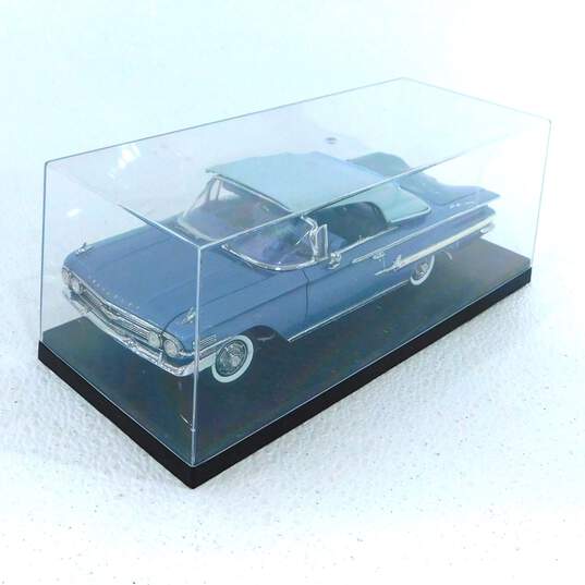 Danbury Mint 1/24 1960 Blue Impala Convertible Limited Edition image number 1