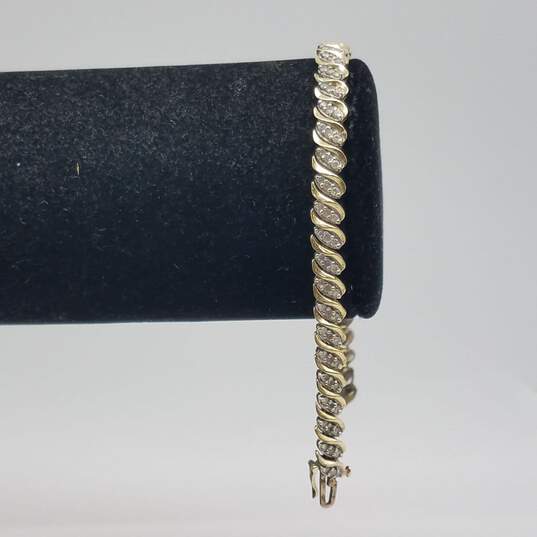 WM 10k Gold Melee Diamond 7" Tennis Bracelet 9.3g image number 2