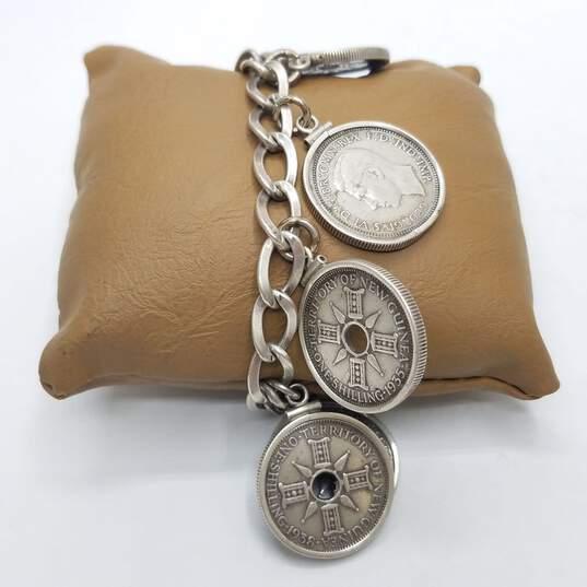 Sterling Silver Assorted Coin 8- Charm 7" Bracelet 68.1g image number 1