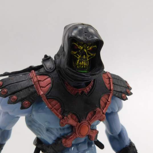 Masters of the Universe SPIN-BLADE SKELETOR And Jungle He-Man Action Figures image number 3