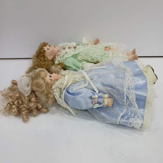 Pair of Seymour Mann Porcelain Dolls image number 5