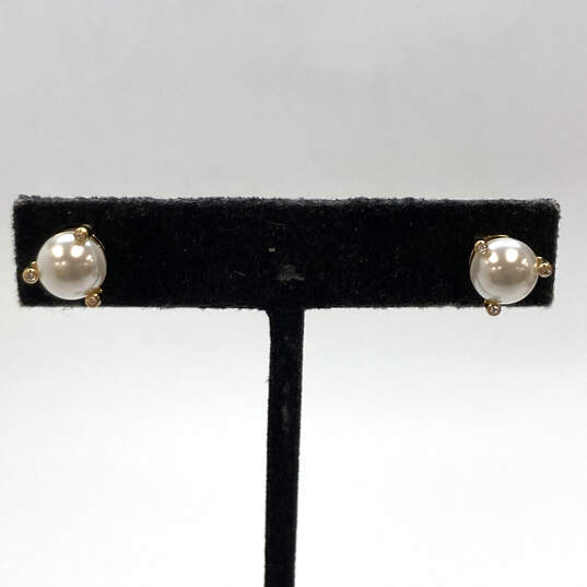 Designer Kate Spade Gold-Tone White Faux Pearl Rhinestone Stud Earrings image number 1