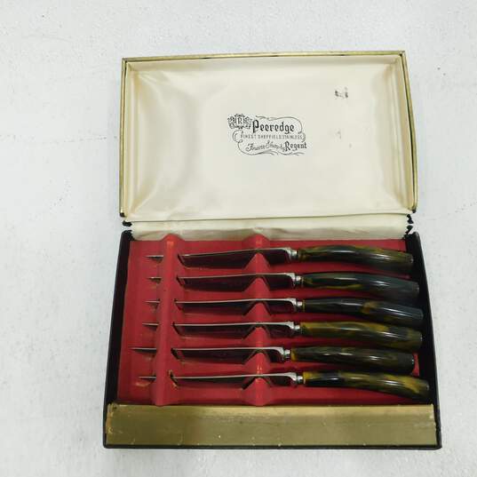 VNTG Regent Sheffield Forever Sharp Steak Knives w/ Brown Swirl Bakelite Handles image number 1