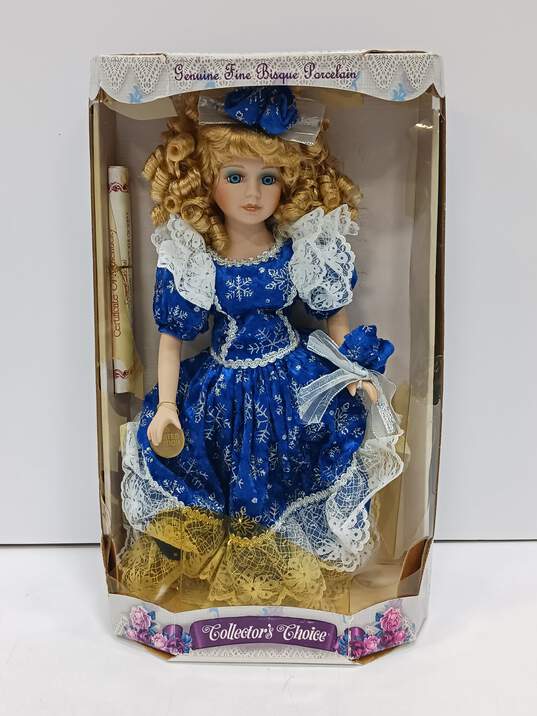 Porcelain Doll of Girl In Blue Dress In Box image number 1