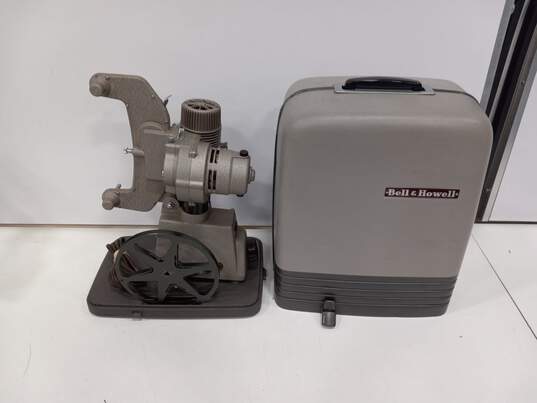 Bell & Howell 122 Eight MM Film Projector in Case image number 1
