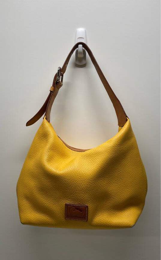 Dooney and Bourke Yellow Leather Zip Tote Bag image number 1