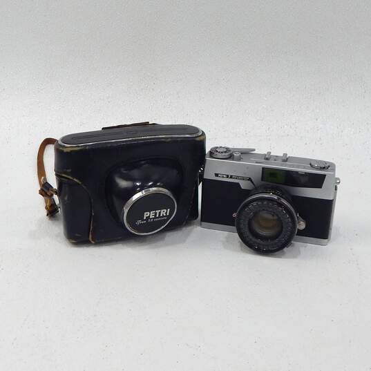 Petri 7 Green-O-Matic System Rangefinder 35mm Film Camera w/ Lens & Leather Case image number 1