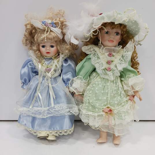 Pair of Seymour Mann Porcelain Dolls image number 1
