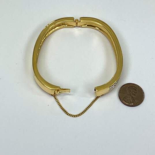 Designer Swarovski Gold-Tone Crystal Hinged Bangle Bracelet image number 2