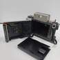 Vintage Polaroid Automatic Land Camera 420 With Accessories in Case image number 4