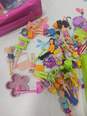 Polly Pocket Lot of Assorted Dolls, Vehicles, & Accessories image number 6