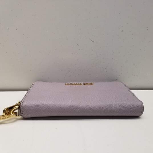 Buy the Michael Kors Purple Wallet | GoodwillFinds