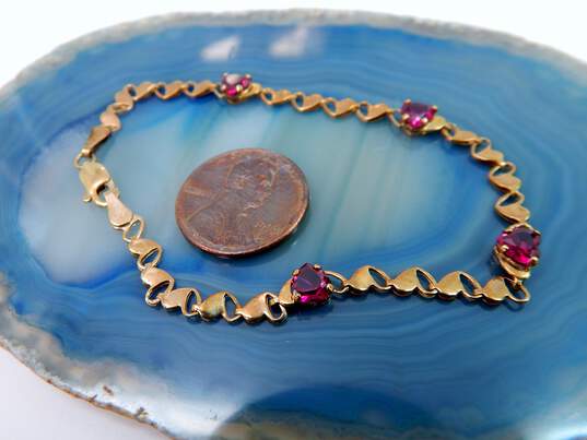 10K Yellow Gold Faceted Ruby Hearts Linked Chain Bracelet 3.0g image number 4