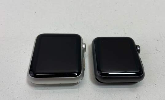 Apple Watches Series 7000 38MM & 42MM - Lot of 2 For Parts/Repair image number 1