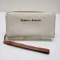 Dooney And Bourke DB Natural Or Ivory Claremont Caldwell Wallet image number 1