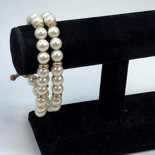 Designer Juicy Couture Gold-Tone Toggle Beaded Wrap Bracelet image number 1