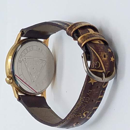 Guess By Georges Marciano Vintage 1994 Gold Tone With Embossed Band Watch image number 9