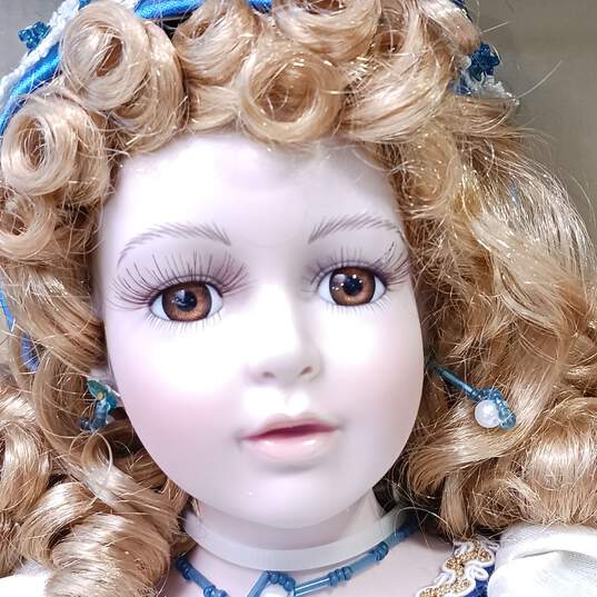 Genuine  Porcelain Doll Collectible Memories image number 3