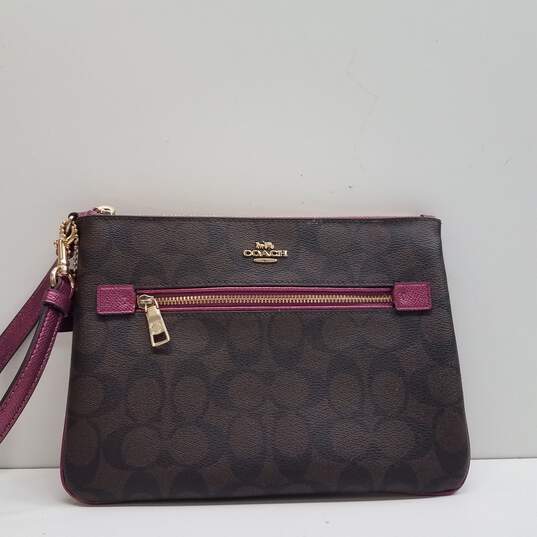 Coach Signature Gallery Pouch Brown Magenta image number 1