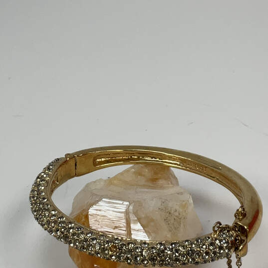 Designer J. Crew Gold-Tone Rhinestone Beaded Classic Bangle Bracelet image number 1