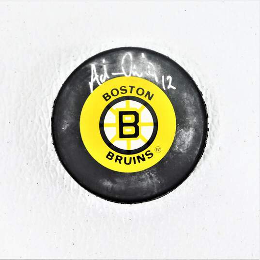 HOF Adam Oates Autographed Hockey Puck Boston Braves image number 1