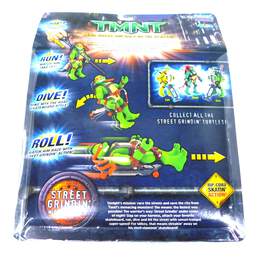 Sealed Playmates TMNT Ninja Turtles Street Grindin Michelangelo Action Figure alternative image