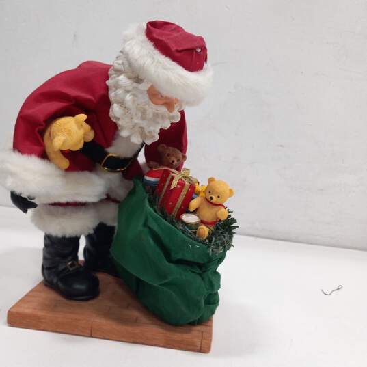 Santa With Presents Ceramic Figurine image number 1