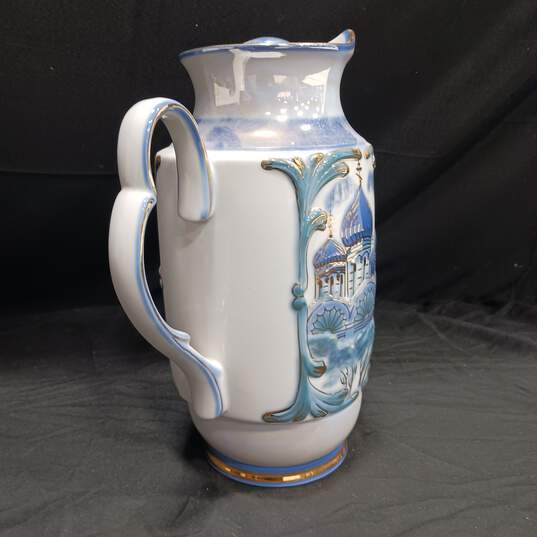 White and Blue Ceramic Pitcher w/Gold Tone Trim image number 2