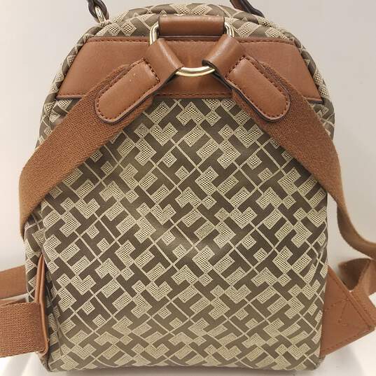 Buy the Tommy Hilfiger Signature Brown Faux Leather Mini Backpack
