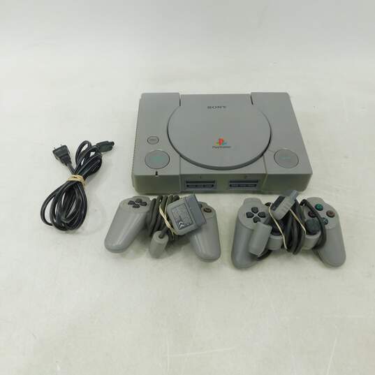 Sony PS1 w/ 2 Controllers image number 1