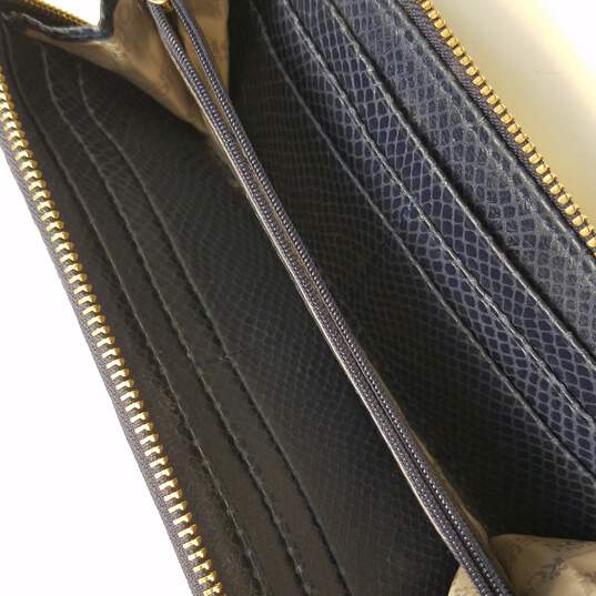 Buy the Michael Kors Navy Blue Snake Print Leather Zip Around Wallet |  GoodwillFinds