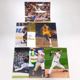 7 Autographed Sports Photos