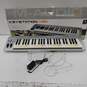 M-Audio Keystation 49e keyboard *Powers on, otherwise untested image number 1