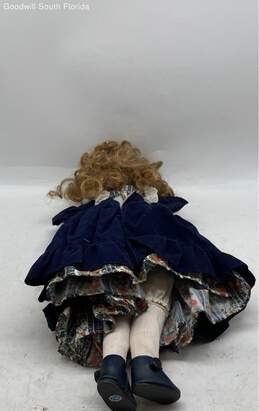 Collectible Porcelain Doll In Blue Dress alternative image