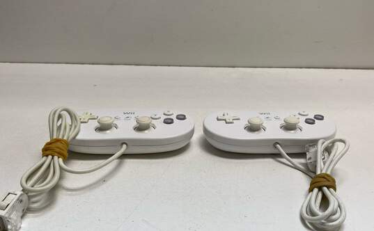 Set Of 2 Nintendo Wii Classic Controllers- White image number 1