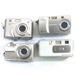 Olympus & HP Assorted Compact Digital Camera Lot of 4 alternative image