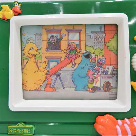 Vintage Sesame Street Tv Scrolling Toy • Musical • Big Bird • 1988 • ILLCO image number 7