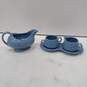 4 PIECE FIESTA WARE ITEMS SUGAR BOWL ,CREAMER WITH TRAY AND A GRAVY BOAT image number 1