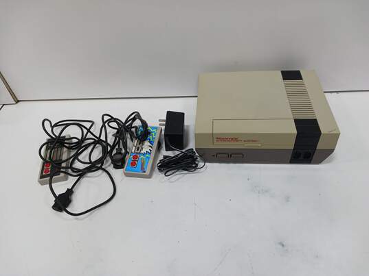 Nintendo Entertainment System w/Cables and Controller image number 1