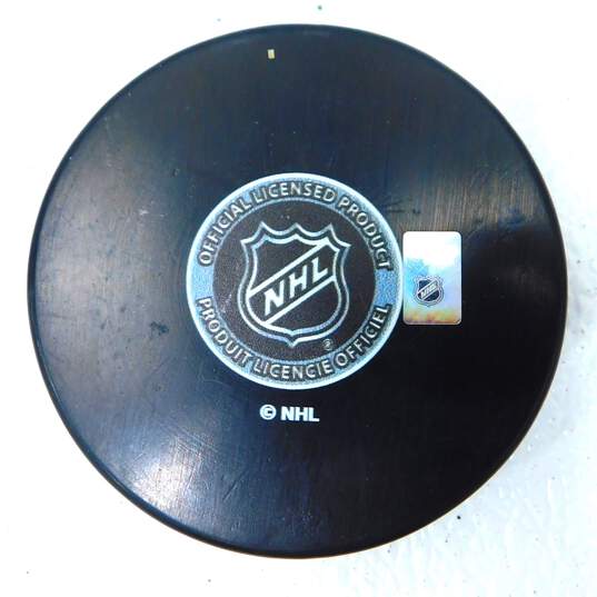 Dylan Strome Autographed Hockey Puck Chicago Blackhawks image number 2