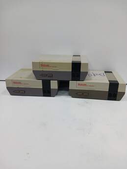 3 Nintendo Entertainment Systems PARTS/REPAIRS SOLD AS IS