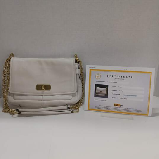 Authenticated Women's Coach Signature Chelsea Gold Chain Crossbody Bag image number 1