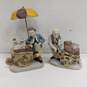 Pair of Vintage Mira's Collection Salesman Figurines image number 1