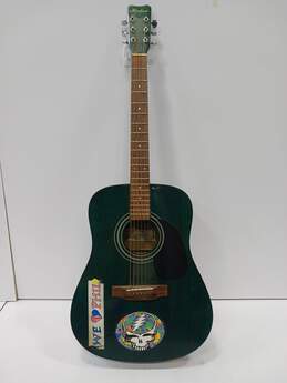 Green Hand Craft Acoustic Guitar Covered In Stickers