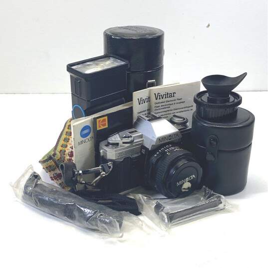 Minolta X-370 35mm SLR Camera with 3 Lenses, Flash and Accessories image number 1